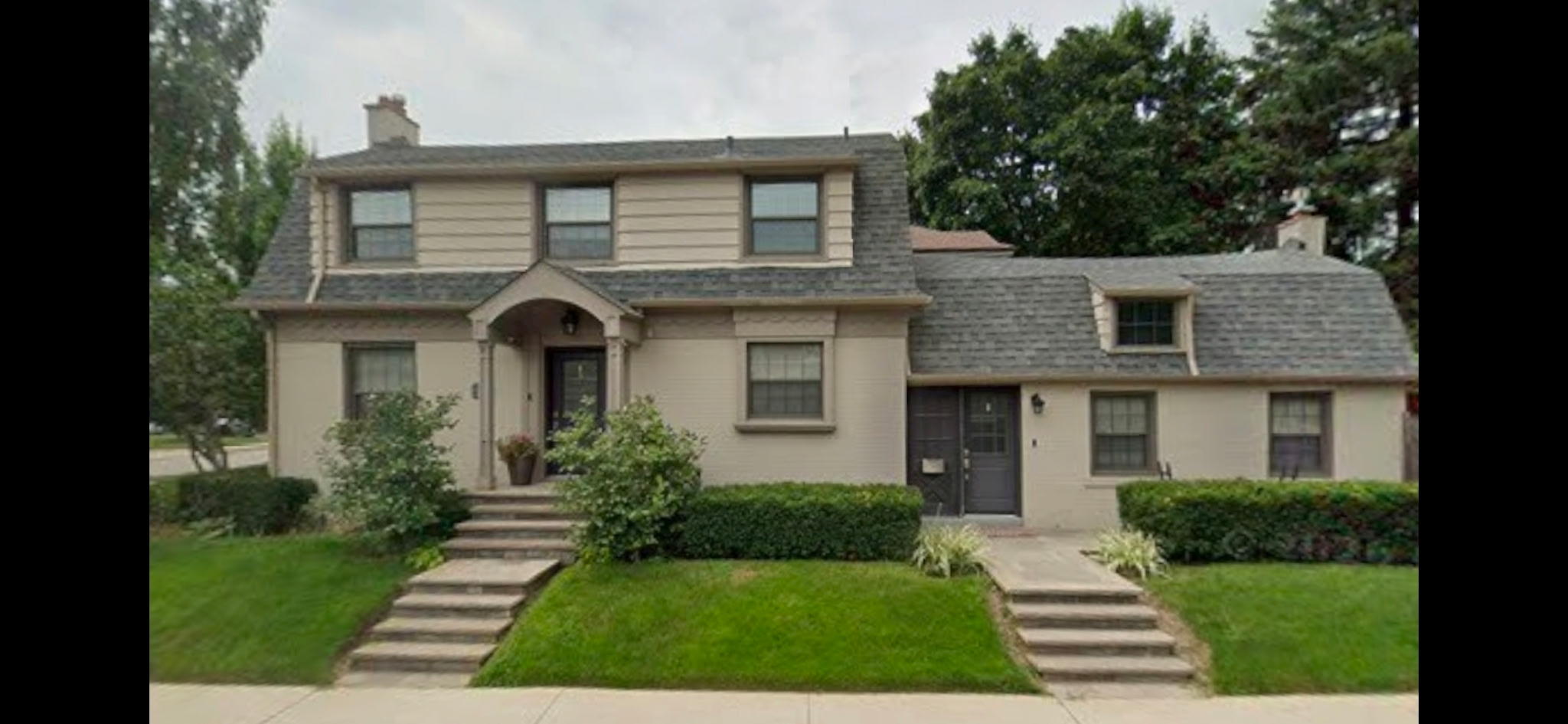 Downtown Toronto home before wood siding replacement
