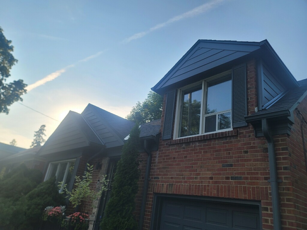 Completed James Hardie siding replacement on a home in The Kingsway, Toronto